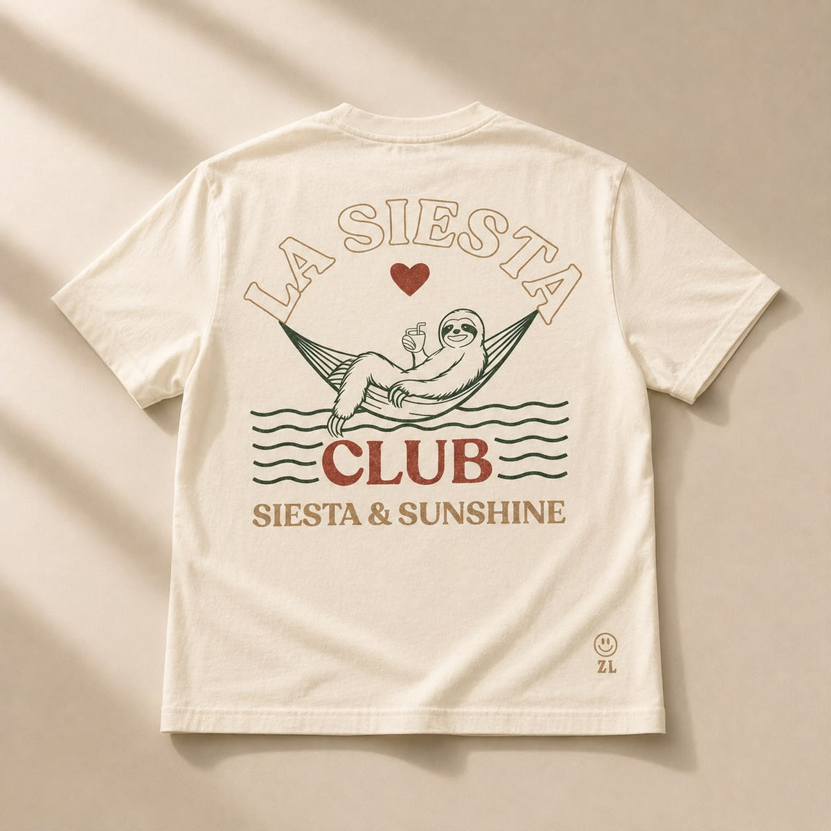 La Siesta Club Tee in cream with hammock sloth graphic — back view